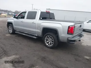 2017 GMC Sierra 1500 SLT z VIN 3GTU2NECXHG451794, wystawiony jako IAAI lot #40865850 z przebiegiem 243 866 mil mil oraz . Historia ofert i sprzedaży dostępna na DreamBid. Obrazek 3.