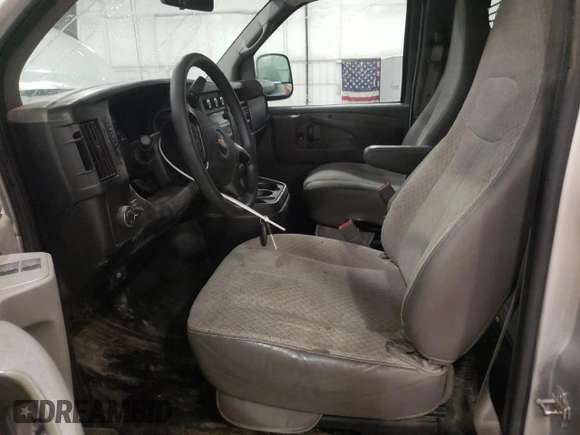 2015 Chevrolet Express Cargo with VIN 1GCWGFCF9F1116132, listed as a Copart auction lot 50924125 with 147,150 mi miles and Salvage title. Bid and sale history available at DreamBid. Image 7.