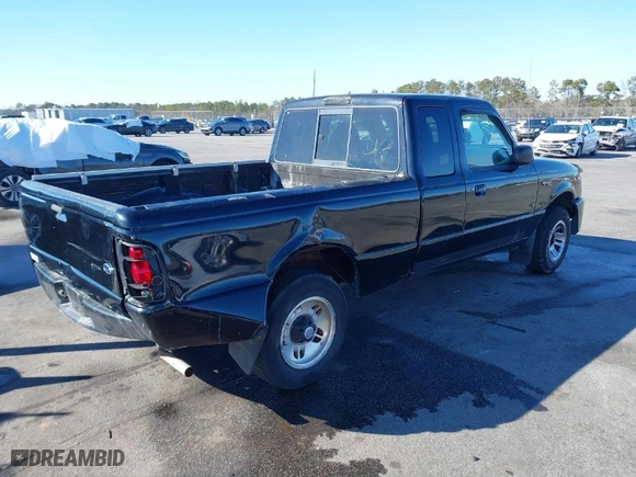1999 Ford Ranger XL with VIN 1FTYR14X6XTA83979, listed as a IAAI auction lot 41355593 with 201,284 mi miles. Bid and sale history available at carsss.com. Image 4.