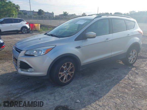 2013 Ford Escape SEL z VIN 1FMCU9HX8DUC26143, wystawiony jako IAAI lot #42815698 z przebiegiem 255 242 mil mil oraz . Historia ofert i sprzedaży dostępna na DreamBid. Obrazek 2.