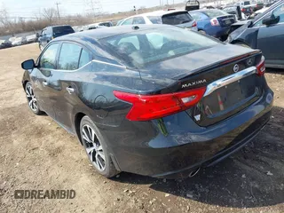 2016 Nissan Maxima SL with VIN 1N4AA6APXGC421111, listed as a IAAI auction lot 41803879 with 133,418 mi miles and . Bid and sale history available at DreamBid. Image 3.