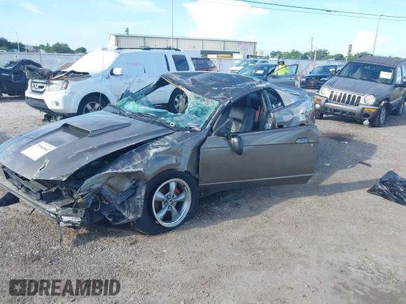 2004 Ford Mustang Standard z VIN 1FAFP40684F194867, wystawiony jako IAAI lot #39963442 z przebiegiem Nie podano mil oraz . Historia ofert i sprzedaży dostępna na DreamBid. Obrazek 17.