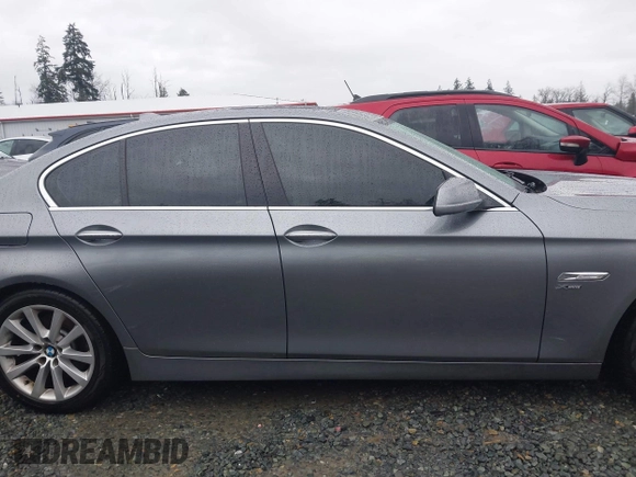 2012 BMW 5 Series 528i xDrive with VIN WBAXH5C52CDW05286, listed as a IAAI auction lot 41216636 with 99,543 mi miles and . Bid and sale history available at DreamBid. Image 13.