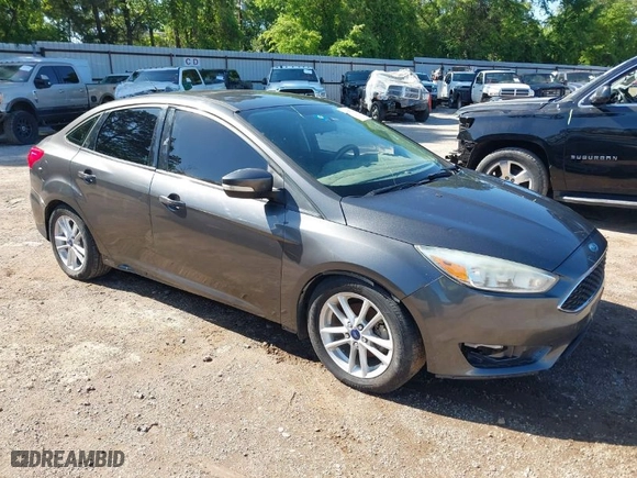 2015 Ford Focus SE with VIN 1FADP3F24FL219760, listed as a IAAI auction lot 41947221 with 163,259 mi miles. Bid and sale history available at carsss.com. Image 1.