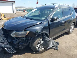 2015 Nissan Rogue SL with VIN 5N1AT2MV0FC767735, listed as a IAAI auction lot 41952625 with 134,870 mi miles and . Bid and sale history available at carsss.com. Image 2.