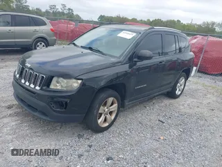 2012 Jeep Compass Sport with VIN 1C4NJCBB7CD602085, listed as a IAAI auction lot 41955425 with 134,721 mi miles. Bid and sale history available at carsss.com. Image 2.