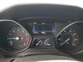 2017 Ford Focus SE z VIN 1FADP3F28HL270925, wystawiony jako Copart lot #56149505 z przebiegiem 27 544 mil mil oraz Szkoda całkowita • Salvage title. Historia ofert i sprzedaży dostępna na DreamBid. Obrazek 9.