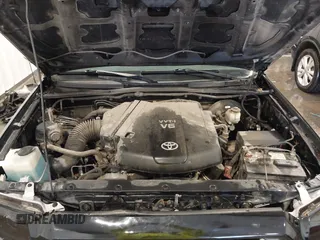 2013 Toyota Tacoma with VIN 5TFUU4EN4DX076111, listed as a IAAI auction lot 42068015 with 152,837 mi miles and . Bid and sale history available at DreamBid. Image 10.