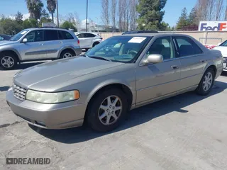 2002 Cadillac Seville Luxury SLS with VIN 1G6KS54Y92U207873, listed as a IAAI auction lot 41957595 with 118,580 mi miles. Bid and sale history available at carsss.com. Image 2.