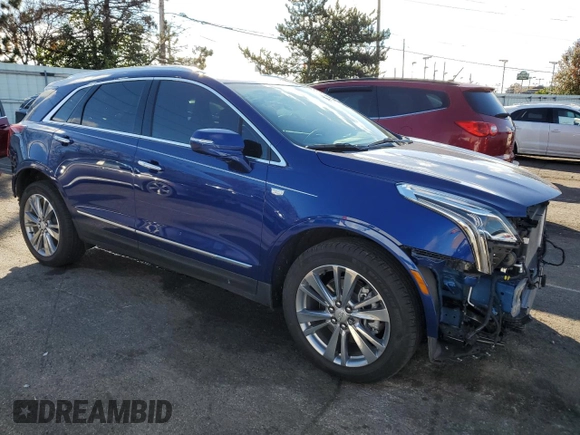 2023 Cadillac XT5 AWD Premium Luxury with VIN 1GYKNDR49PZ135890, listed as a Copart auction lot 79808584 with 21,708 mi miles and Salvage Title. Bid and sale history available at DreamBid. Image 4.