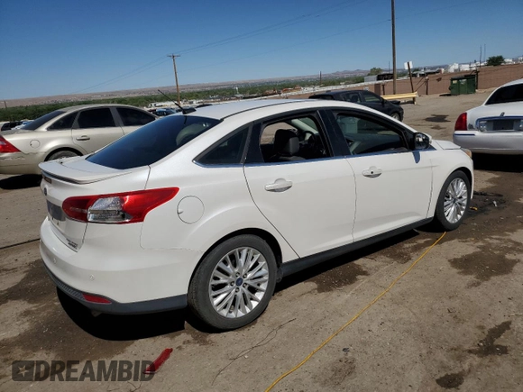 2015 Ford Focus Titanium with VIN 1FADP3J23FL300126, listed as a Copart auction lot 54434165 with 176,526 mi miles and Salvage title. Bid and sale history available at DreamBid. Image 3.