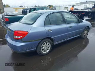2003 Kia Rio with VIN KNADC125736227286, listed as a IAAI auction lot 41928174 with 151,431 mi miles. Bid and sale history available at carsss.com. Image 4.