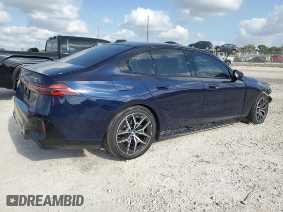 2024 BMW i5 eDrive40 with VIN WBY33FK09RCR50159, listed as a Copart auction lot 55520615 with 12,564 mi miles and Salvage title. Bid and sale history available at DreamBid. Image 3.