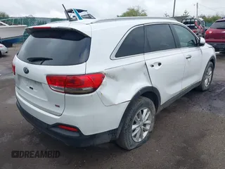2016 Kia Sorento LX with VIN 5XYPG4A37GG174923, listed as a IAAI auction lot 42180134 with 101,436 mi miles and . Bid and sale history available at carsss.com. Image 4.