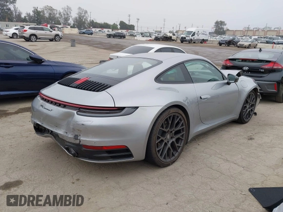 2023 Porsche 911 Carrera with VIN WP0AA2A93PS206048, listed as a IAAI auction lot 42022225 with 6,439 mi miles and . Bid and sale history available at DreamBid. Image 4.