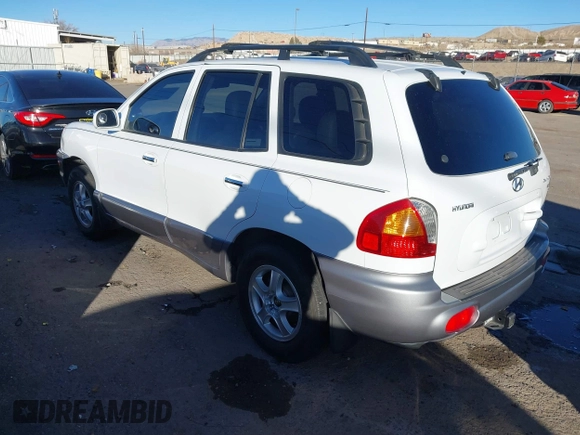 2002 Hyundai Santa Fe GLS with VIN KM8SC73D82U294374, listed as a IAAI auction lot 41204011 with 179,219 mi miles. Bid and sale history available at carsss.com. Image 3.