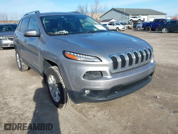 2014 Jeep Cherokee Latitude with VIN 1C4PJMCSXEW125737, listed as a IAAI auction lot 41863778 with 120,226 mi miles. Bid and sale history available at carsss.com. Image 1.