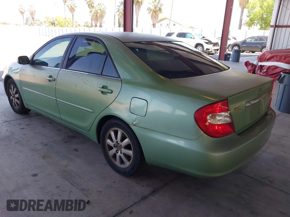 2002 Toyota Camry LE z VIN 4T1BE30K02U096796, wystawiony jako IAAI lot #42230108 z przebiegiem 249 883 mil mil oraz . Historia ofert i sprzedaży dostępna na DreamBid. Obrazek 3.