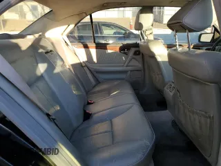 1999 Mercedes-Benz E-Class with VIN WDBJF82H9XX026911, listed as a Copart auction lot 48808835 with 205,953 mi miles and Salvage Title. Bid and sale history available at carsss.com. Image 10.