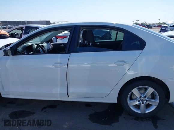 2012 Volkswagen Jetta S z VIN 3VW1K7AJ2CM331367, wystawiony jako IAAI lot #42294252 z przebiegiem 162 373 mil mil oraz . Historia ofert i sprzedaży dostępna na DreamBid. Obrazek 15.