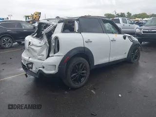 2011 MINI Countryman S z VIN WMWZC5C54BWM10154, wystawiony jako IAAI lot #37722183 z przebiegiem Nie podano mil oraz . Historia ofert i sprzedaży dostępna na DreamBid. Obrazek 4.