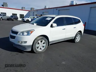 2012 Chevrolet Traverse 1LT with VIN 1GNKRGED9CJ131856, listed as a IAAI auction lot 41708623 with 77,329 mi miles and . Bid and sale history available at DreamBid. Image 2.