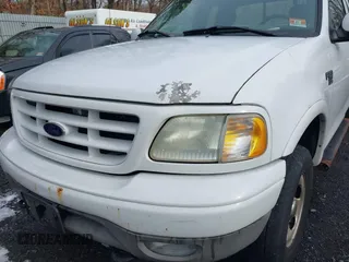 2003 Ford F-150 XL with VIN 1FTRX18W43NB84285, listed as a IAAI auction lot 41494919 with 197,352 mi miles. Bid and sale history available at carsss.com. Image 6.