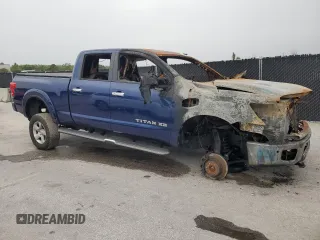 2017 Nissan Titan Pro-4X z VIN 1N6BA1F48HN538284, wystawiony jako Copart lot #58839655 z przebiegiem Nie podano mil oraz Nie do naprawy • Non repairable. Historia ofert i sprzedaży dostępna na DreamBid. Obrazek 4.