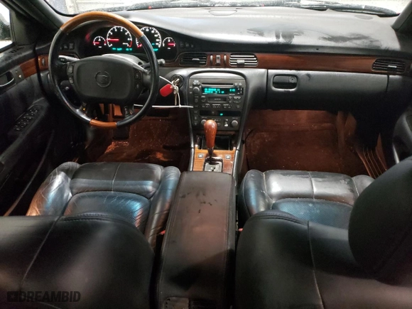 2002 Cadillac Seville Touring STS with VIN 1G6KY54962U158476, listed as a Copart auction lot 86624774 with 77,818 mi miles and Salvage Title. Bid and sale history available at carsss.com. Image 8.