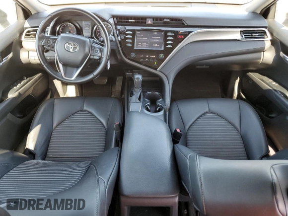 2018 Toyota Camry LE z VIN 4T1B11HK4JU053856, wystawiony jako Copart lot #61017095 z przebiegiem 134 977 mil mil oraz Szkoda całkowita • Salvage title. Historia ofert i sprzedaży dostępna na DreamBid. Obrazek 8.