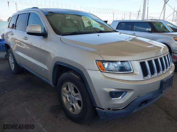 2014 Jeep Grand Cherokee Laredo with VIN 1C4RJFAG7EC380544, listed as a IAAI auction lot 42021130 with 166,589 mi miles. Bid and sale history available at carsss.com. Image 1.