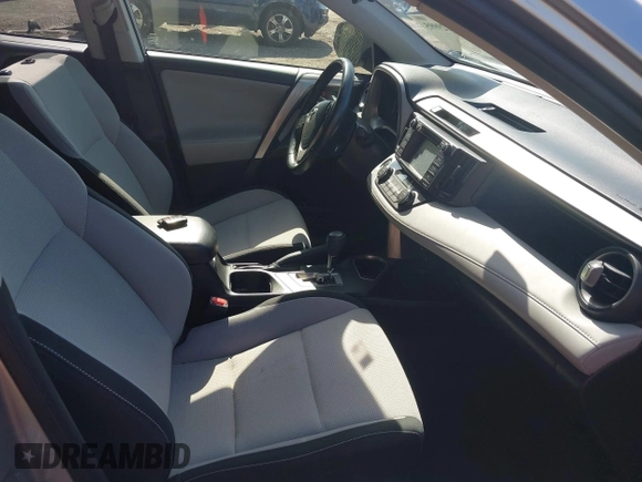 2018 Toyota RAV4 XLE with VIN JTMWFREV9JJ203353, listed as a IAAI auction lot 42129995 with 41,806 mi miles and . Bid and sale history available at DreamBid. Image 5.
