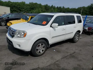 2010 Honda Pilot Touring z VIN 5FNYF4H81AB023325, wystawiony jako Copart lot #61042725 z przebiegiem 262 470 mil mil oraz Czysty tytuł • Clean title. Historia ofert i sprzedaży dostępna na DreamBid. Obrazek 1.