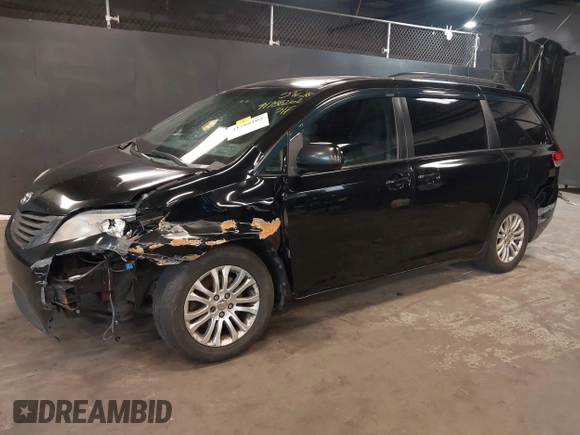 2012 Toyota Sienna XLE AAS with VIN 5TDYK3DCXCS208178, listed as a IAAI auction lot 41788262 with 329,823 mi miles and . Bid and sale history available at carsss.com. Image 2.