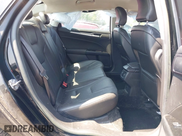 2016 Ford Fusion Titanium z VIN 3FA6P0K97GR174228, wystawiony jako IAAI lot #42636326 z przebiegiem 110 288 mil mil oraz . Historia ofert i sprzedaży dostępna na DreamBid. Obrazek 8.