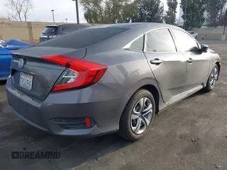 2017 Honda Civic Sedan LX with VIN 19XFC2F59HE204377, listed as a IAAI auction lot 41706604 with 160,114 mi miles. Bid and sale history available at carsss.com. Image 4.