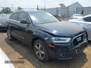 2015 Audi Q3 Premium Plus z VIN WA1BFCFS6FR006515, wystawiony jako IAAI lot #42427014 z przebiegiem 41 666 mil mil oraz . Historia ofert i sprzedaży dostępna na DreamBid. Obrazek 1.