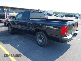 2006 Dodge Dakota SLT z VIN 1D7HE42NX6S666354, wystawiony jako IAAI lot #42394779 z przebiegiem 124 633 mil mil oraz . Historia ofert i sprzedaży dostępna na DreamBid. Obrazek 3.