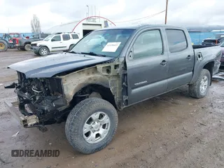 2013 Toyota Tacoma with VIN 3TMLU4EN7DM113315, listed as a IAAI auction lot 41938415 with 228,912 mi miles and . Bid and sale history available at DreamBid. Image 18.