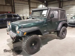 1999 Jeep Wrangler SE with VIN 1J4FY29P4XP457291, listed as a IAAI auction lot 41549758 with 133,362 mi miles and . Bid and sale history available at DreamBid. Image 2.