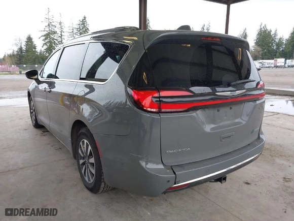 2021 Chrysler Pacifica Hybrid Touring L with VIN 2C4RC1L78MR581255, listed as a IAAI auction lot 41913443 with 71,193 mi miles. Bid and sale history available at carsss.com. Image 3.