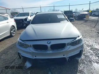 2018 BMW 4 Series 430i with VIN WBA4J1C56JBG80262, listed as a IAAI auction lot 41451833 with 148,487 mi miles and . Bid and sale history available at carsss.com. Image 13.