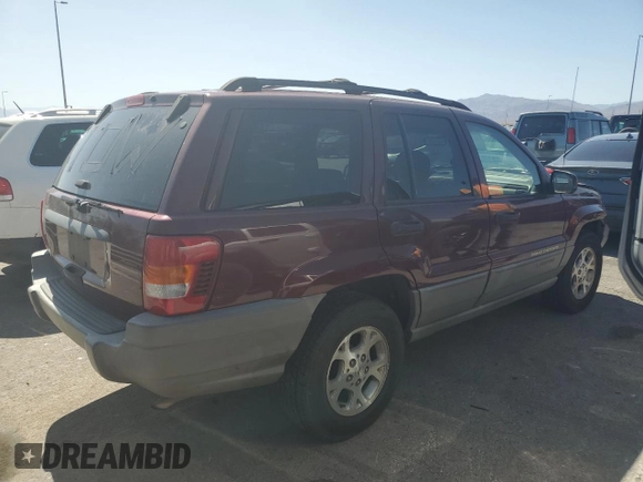 2000 Jeep Grand Cherokee Laredo with VIN 1J4G248S1YC407769, listed as a Copart auction lot 61653545 with 188,882 mi miles and Salvage title. Bid and sale history available at DreamBid. Image 3.