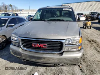 2001 GMC Yukon SLT z VIN 1GKEC13T71J223368, wystawiony jako Copart lot #86610954 z przebiegiem 414 811 mil mil oraz Szkoda całkowita • Salvage title. Historia ofert i sprzedaży dostępna na DreamBid. Obrazek 5.