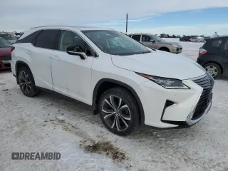2018 Lexus RX 350L Premium with VIN JTJDZKCAXJ2004891, listed as a Copart auction lot 83044974 with 102,287 mi miles and Clean title. Bid and sale history available at DreamBid. Image 4.