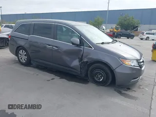 2016 Honda Odyssey EX-L with VIN 5FNRL5H68GB104350, listed as a IAAI auction lot 42023306 with 124,672 mi miles. Bid and sale history available at carsss.com. Image 1.