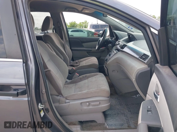 2016 Honda Odyssey LX with VIN 5FNRL5H27GB003250, listed as a IAAI auction lot 42103335 with 151,516 mi miles and . Bid and sale history available at DreamBid. Image 5.