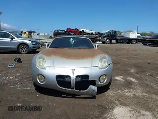 2007 Pontiac Solstice z VIN 1G2MB35B37Y137084, wystawiony jako IAAI lot #41751483 z przebiegiem 68 241 mil mil oraz . Historia ofert i sprzedaży dostępna na DreamBid. Obrazek 13.