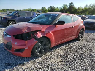 2014 Hyundai Veloster z VIN KMHTC6AD8EU213234, wystawiony jako Copart lot #53297535 z przebiegiem 131 769 mil mil oraz Szkoda całkowita • Salvage title. Historia ofert i sprzedaży dostępna na DreamBid. Obrazek 1.