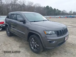 2021 Jeep Grand Cherokee Limited z VIN 1C4RJFBG5MC857727, wystawiony jako IAAI lot #38874272 z przebiegiem 28 806 mil mil oraz . Historia ofert i sprzedaży dostępna na DreamBid. Obrazek 1.